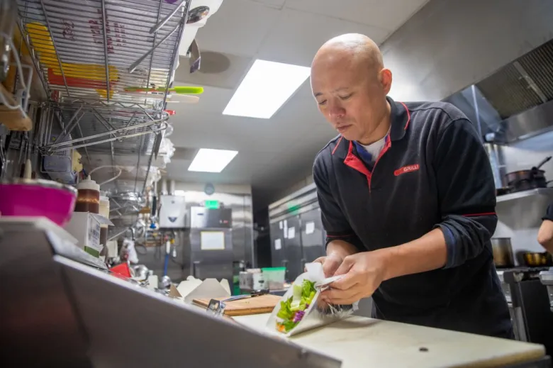 Yiyi Chen, restaurant owner and technology consultant, at Yami Grill in Mountain View, California